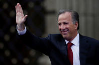 Institutional Revolutionary Party (PRI) presidential candidate Jose Antonio Meade waves while arriving at Palacio de Mineria for the first presidential debate in Mexico City, Mexico April 22, 2018. REUTERS/Henry Romero