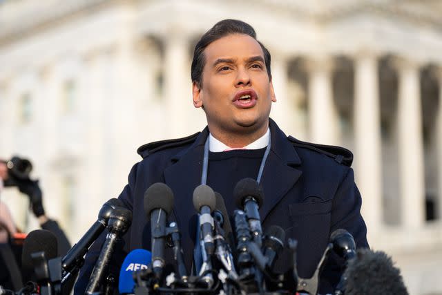 <p>Bill Clark/CQ-Roll Call, Inc via Getty</p> George Santos speaks to media on Nov. 30, one day before his historic expulsion from the House