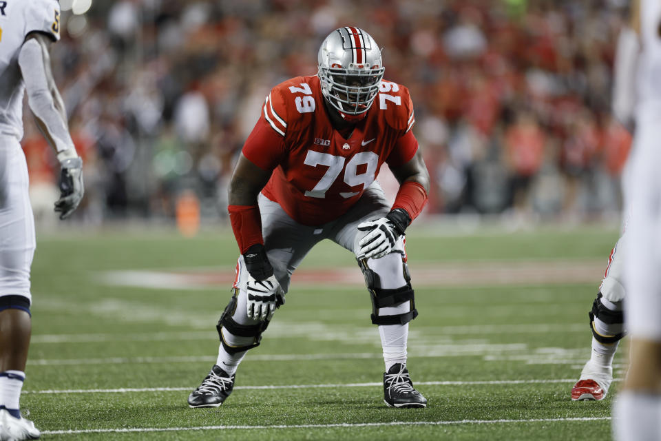 FILE - Ohio State's Dawand Jones lines up during an NCAA college football game against Toledo, Saturday, Sept. 17, 2022, in Columbus, Ohio. With the first of two fourth-round picks on Saturday, the Browns selected Jones, a 6-foot-8, 380-pound offensive tackle with an 88-inch wingspan, 37-inch arms and a high school highlight reel filled with dunks and other on-court moves a super-sized person like him shouldn't be making. (AP Photo/Jay LaPrete, File)