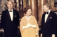 FILE - In this file photo dated May 1977, U.S. President Jimmy Carter, right, and Britain's Queen Elizabeth II are photographed with French President Valery Giscard d'Estaing, at Buckingham Palace in London. Valery Giscard d’Estaing, the president of France from 1974 to 1981 who became a champion of European integration, has died Wednesday, Dec. 2, 2020 at the age of 94, his office and the French presidency said. (Pool Photo via AP, File)