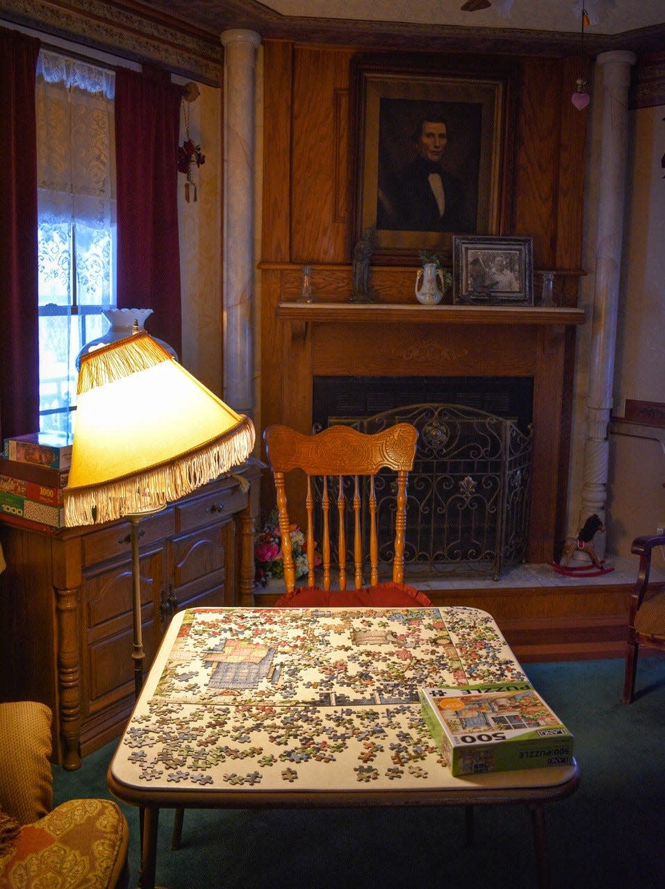 An unfinished puzzle still lies on a table in Grace Sidell’s living room. Sidell, who died on Dec. 12, welcomed hundreds of people into her home in the 60 years she lived there.