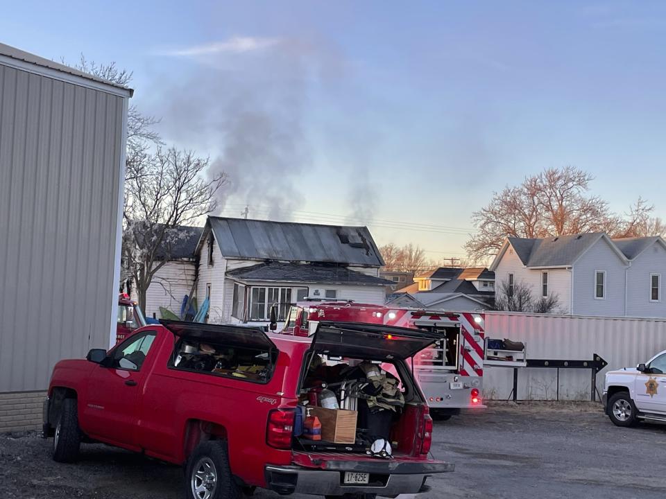 Multiple area fire departments assist Pierce Fire & Rescue at the scene of a house fire early Saturday morning, Jan. 29, 2022, in Pierce, Neb. (Kathryn Harris/The Norfolk Daily News via AP)