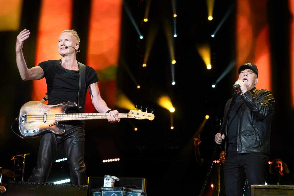 <p>Myrna M. Suarez/Getty</p> Sting and Billy Joel performing together in Tampa, Florida at Raymond James Stadium on Feb. 24, 2024