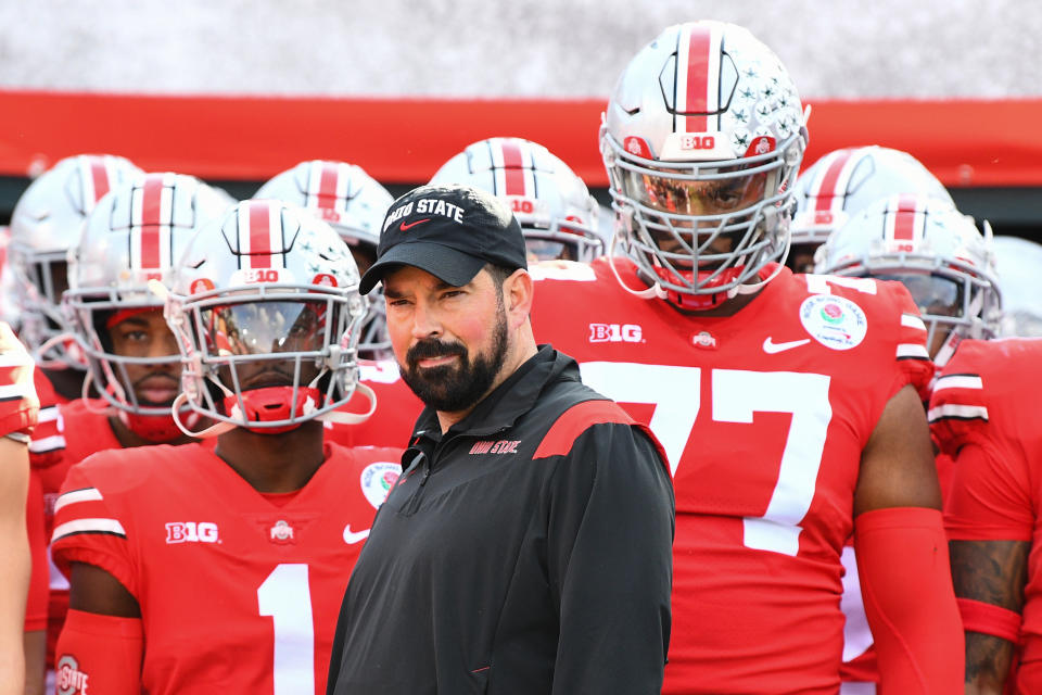 PASADENA, CA - JANUARY 01: Ohio State Buckeyes head coach Ryan Day leads his team out to the field before the Rose Bowl game between the Ohio State Buckeyes and the Utah Utes on January 1, 2022 at the Rose Bowl in Pasadena, CA. (Photo by Brian Rothmuller/Icon Sportswire via Getty Images)