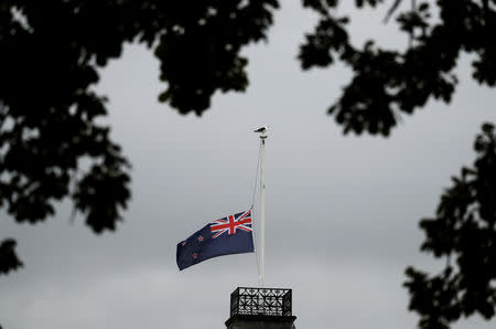The national flag of New Zealand is seen at half mast near Masjid Al Noor after Friday's mosque attacks in Christchurch, New Zealand, March 16, 2019. REUTERS/Jorge Silva/Files