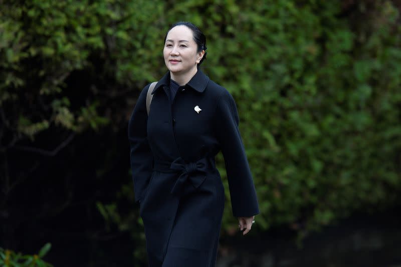 Huawei CFO Meng leaves her home to attend her extradition hearing in Vancouver