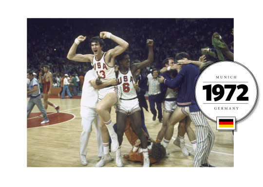 Here, the US team celebrates their victory versus Cuba — but their elation was short-lived; the Soviets beat the US team for the gold in one of the most controversial games in history. (Photo: Getty Images)