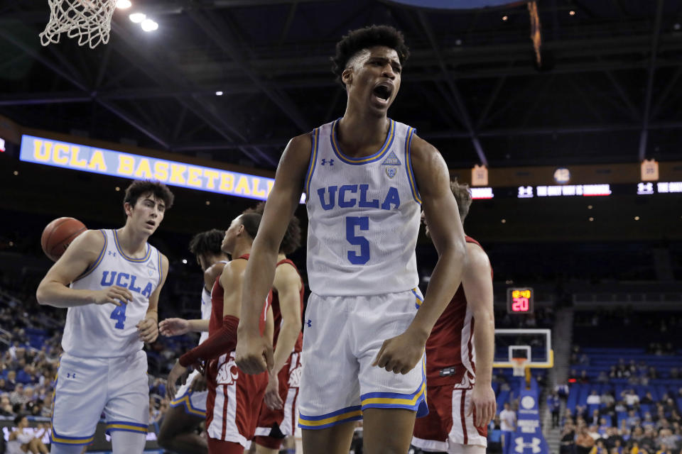 UCLA guard Chris Smith (5) celebrates after scoring against Washington State during the first half of an NCAA college basketball game Thursday, Feb. 13, 2020, in Los Angeles. (AP Photo/Marcio Jose Sanchez)