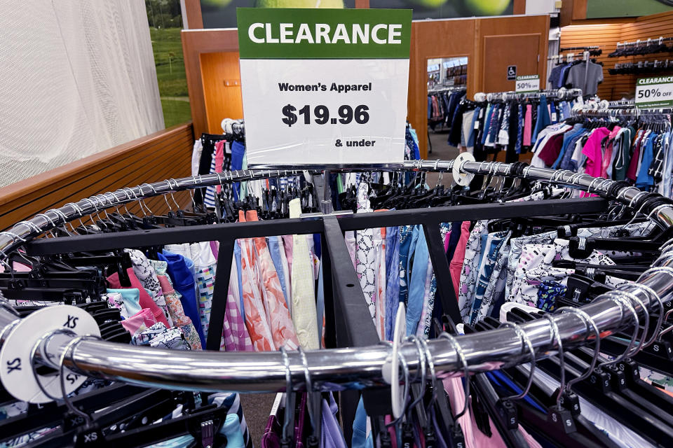 An approval sign is displayed at a clothing store in Downers Grove, Illinois, Monday, April 1, 2024. (AP Photo/Nam Y. Huh)
