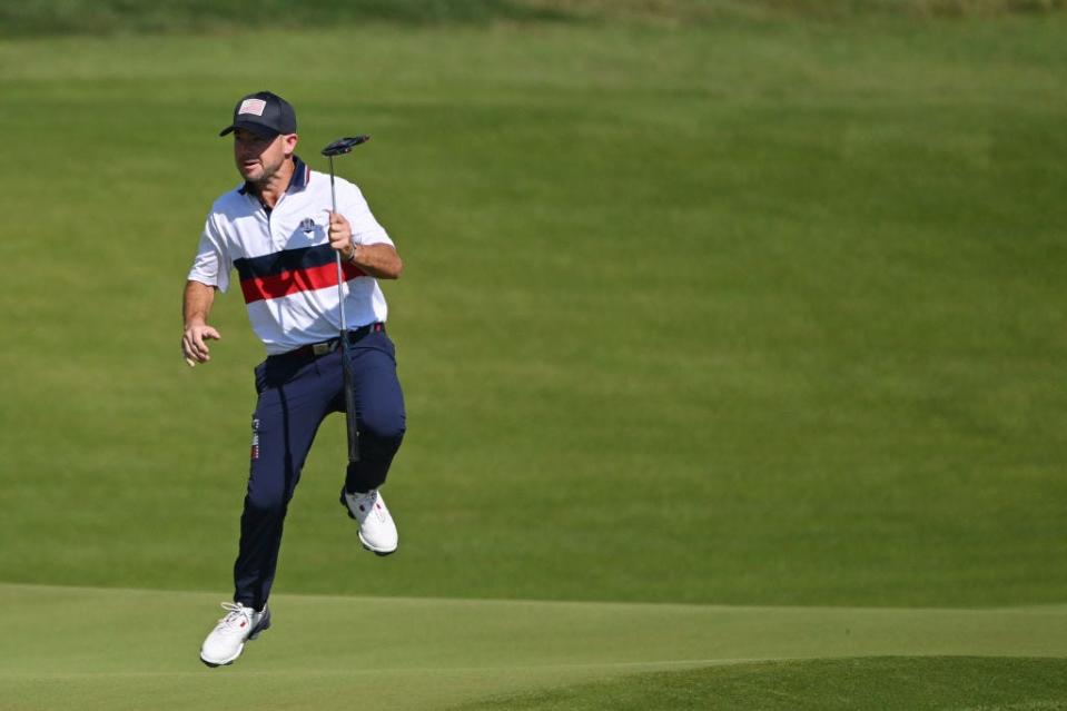 Brian Harman watches one of his putts track towards the hole during a 2023 Ryder Cup doubles match with Max Homa at the Marco Simone Golf Club in Rome. Harman and Homa went 2-0 as a team.