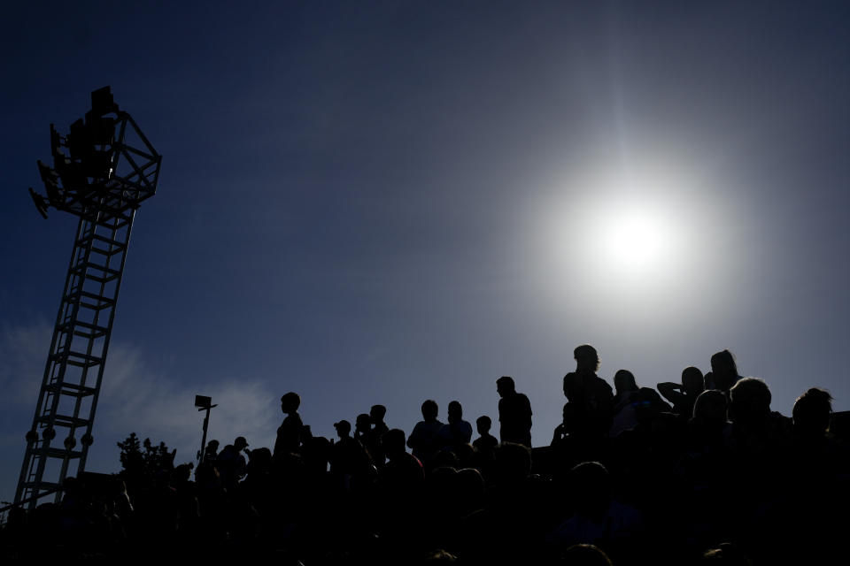 Fans watch a women's professional soccer match between River Plate and Boca Juniors in Ezeiza on the outskirts of Buenos Aires, Argentina, Sunday, March 10, 2024. A growing group of foreigners are joining the Argentinian league as it seeks to boost its recently turned professional women's soccer teams. (AP Photo/Natacha Pisarenko)