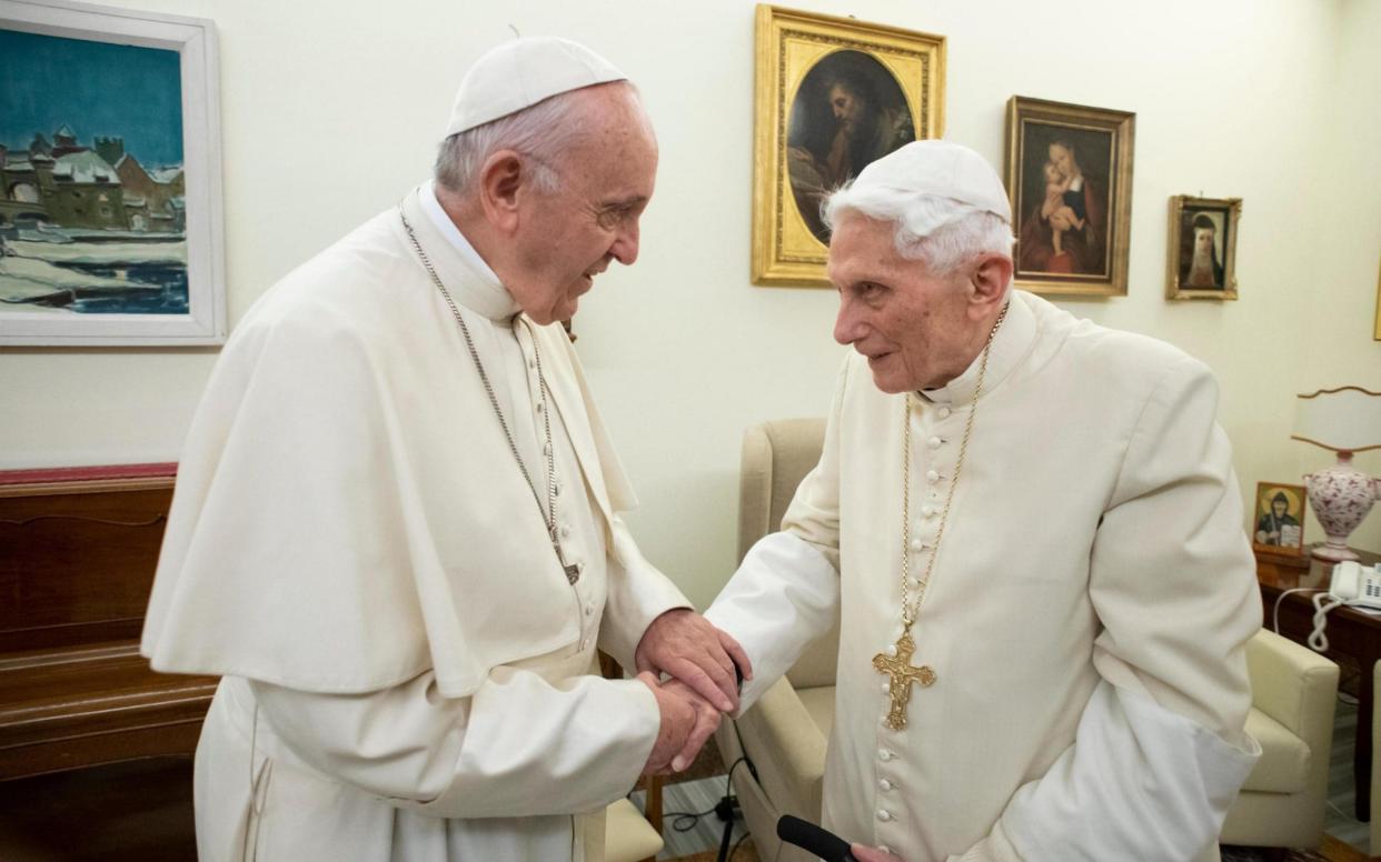 Pope Francis lives just a few hundred yards away from Emeritus Pope Benedict XVI in the Vatican - REX