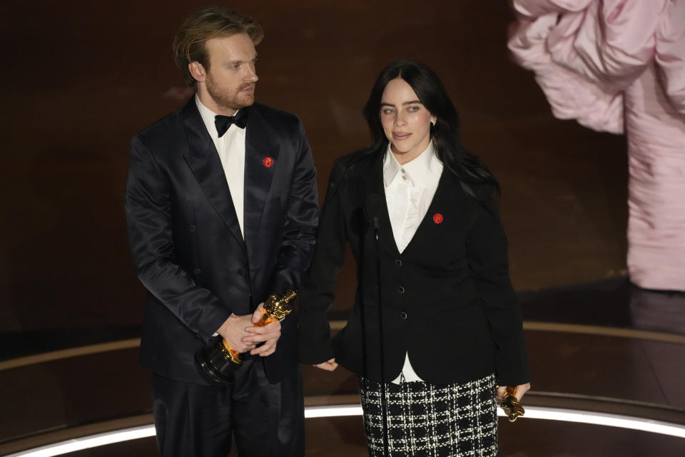 Finneas O'Connell, left, and Billie Eilish accept the award for best original song for "What Was I Made For?" from "Barbie" during the Oscars on Sunday, March 10, 2024, at the Dolby Theatre in Los Angeles. (AP Photo/Chris Pizzello)