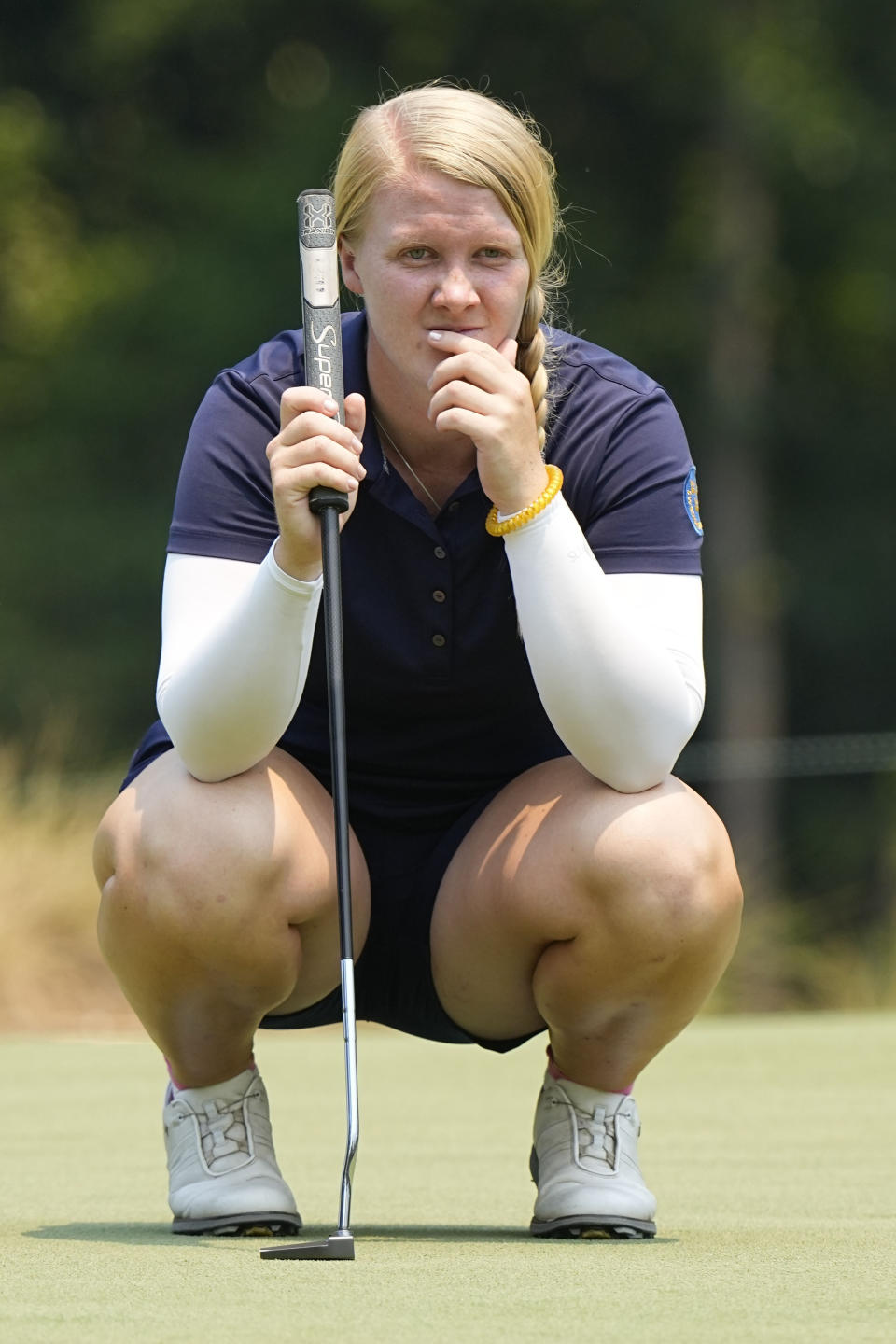 Ingrid Lindblad, of Sweden, eyes her putt on the seventh green during the first round of the U.S. Women's Open golf tournament at the Pine Needles Lodge & Golf Club in Southern Pines, N.C. on Thursday, June 2, 2022. (AP Photo/Steve Helber)