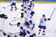 Ice Hockey – Pyeongchang 2018 Winter Olympics – Men Preliminary Round Match – Czech Republic v South Korea - Gangneung Hockey Centre, Gangneung, South Korea – February 15, 2018 - South Korean players bow after the game. REUTERS/Brian Snyder