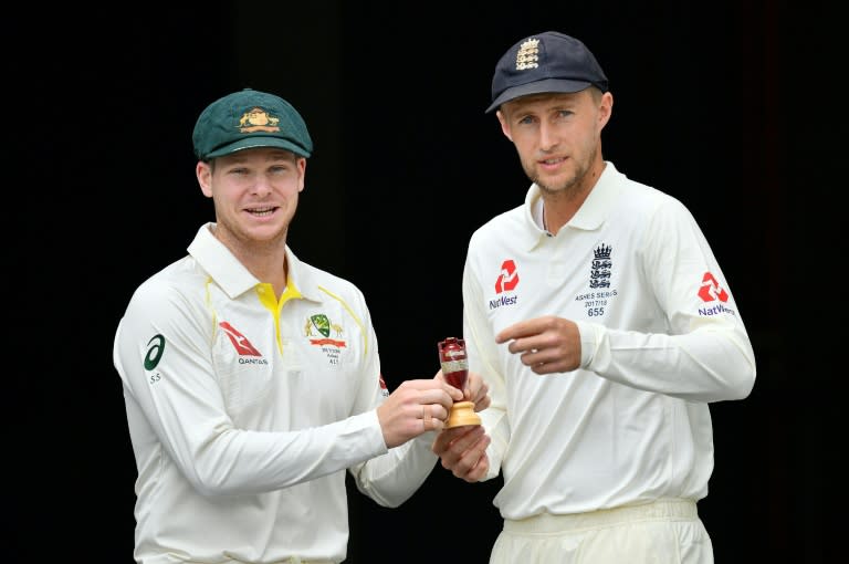 Australia's skipper Steve Smith (L) and Joe Root, Captain of England, pose at a media opportunity in Brisbane on November 22, 2017, on the eve of their first Ashes Test match