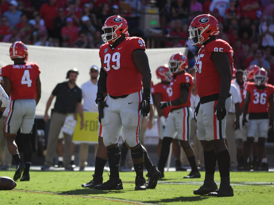 Jordan Davis (L) and Devonte Wyatt were two of the five Georgia defenders picked on Thursday night during the first round of the 2022 NFL draft. (Photo by Jeffrey Vest/Icon Sportswire via Getty Images)