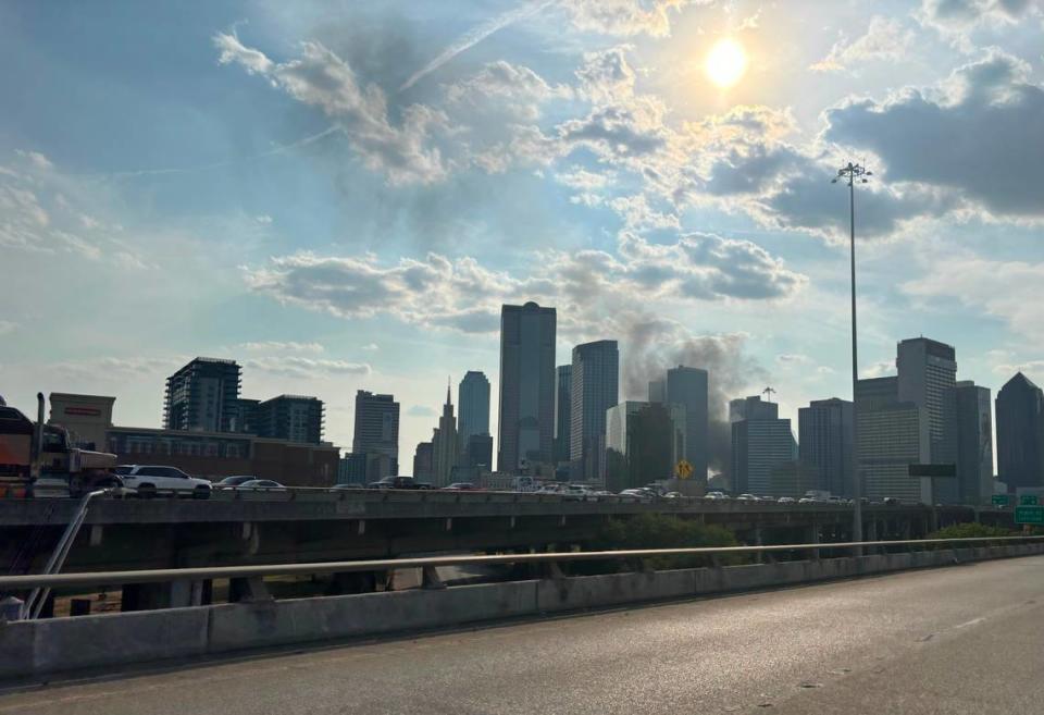 Smoke rises from a church fire at First Baptist Dallas in downtown Dallas on Friday, July 19, 2024.