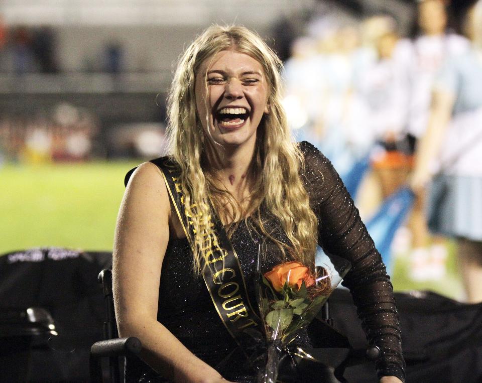 Jillian Romanyk reacts to hearing her name called as homecoming queen.