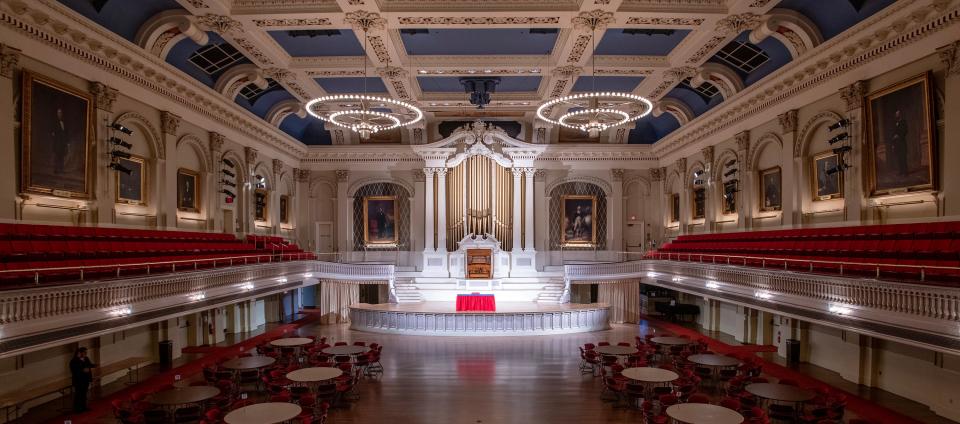 Portraits line the walls inside Mechanics Hall.