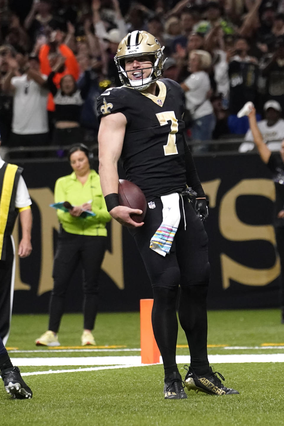 New Orleans Saints' Taysom Hill celebrates his second touch of an NFL football game against the Seattle Seahawks in New Orleans, Sunday, Oct. 9, 2022. (AP Photo/Gerald Herbert)