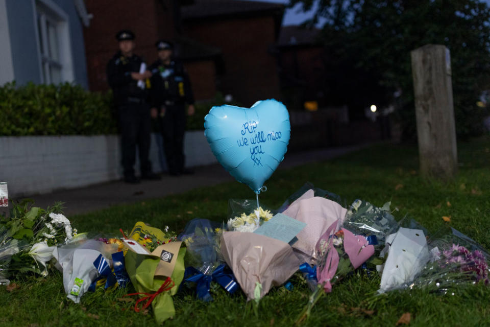 Flowers and a balloon left at the scene. Source: Getty