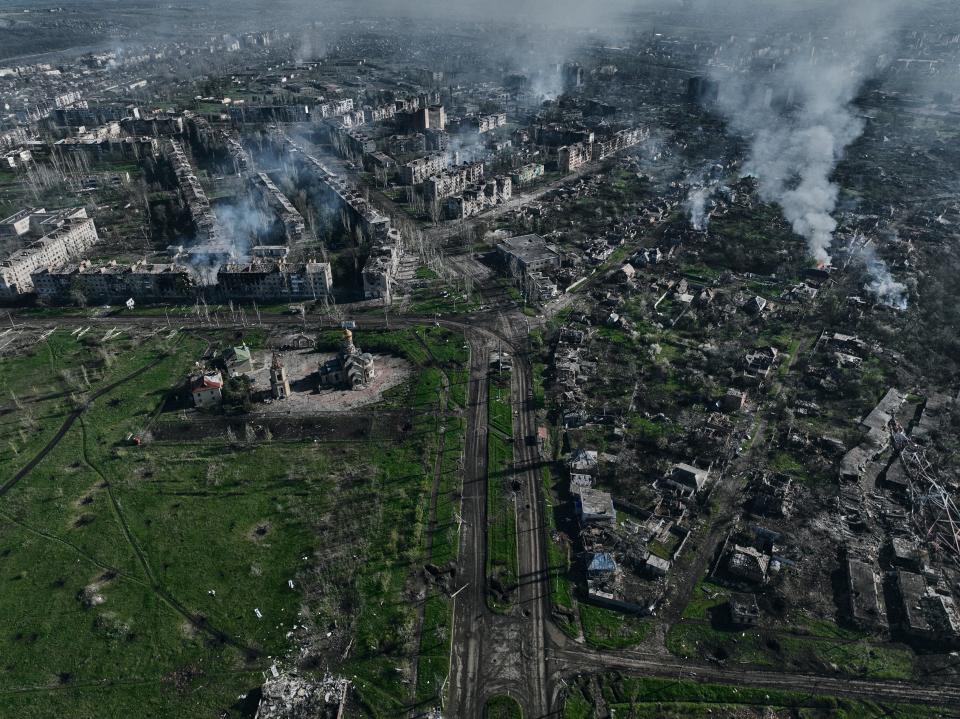 FILE-Smoke rises from buildings in this aerial view of Bakhmut, the site of the heaviest battles with the Russian troops (Copyright 2023 The Associated Press. All rights reserved.)