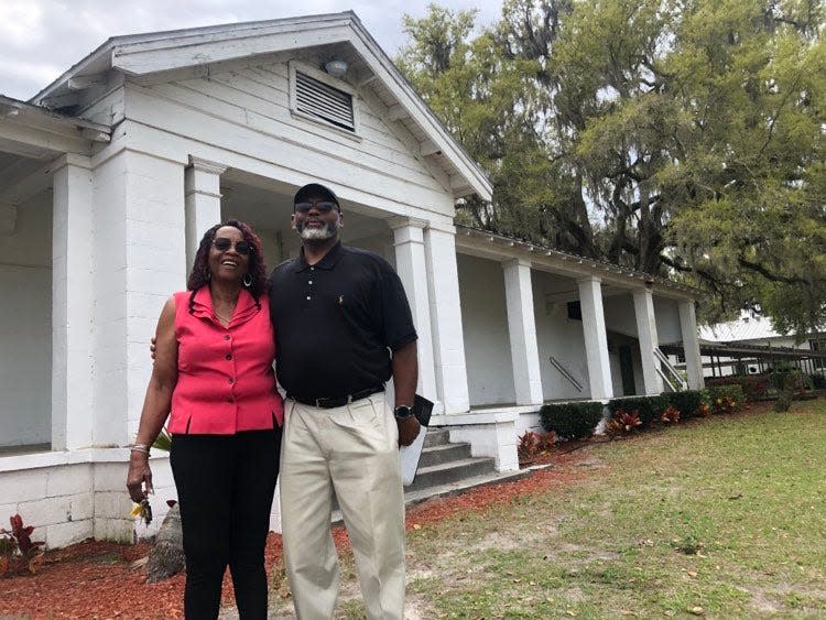 Rodney Mackey Sr. and Dorethea Brown stand outside the historic Glover School in Bealsville near Plant City. Brown attended the school from 1947 to 1955 and later taught there. Mackey is a lifelong Bealsville resident who serves on the board of Bealsville Inc.