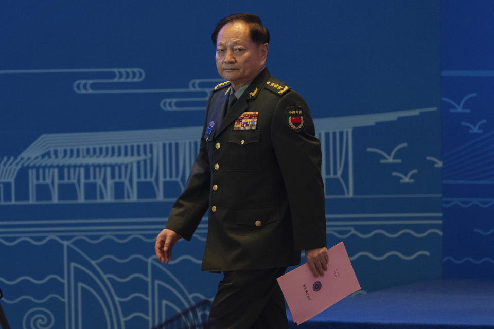 Zhang Youxia, vice chairman of the CPC Central Military Commission, walks down the podium after addressing the Western Pacific Navy Symposium held in Qingdao in eastern China's Shandong province on Monday, April 22, 2024. Zhang, China's second-ranking military leader under Xi Jinping, said China committed to solve maritime disputes through dialogue but warned that International law could not be distorted. (AP Photo/Ng Han Guan)