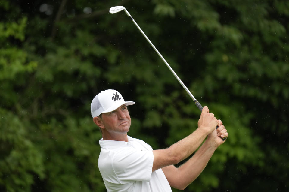 Lucas Glover hits watches his shot off the 16th tee during the final round of the John Deere Classic golf tournament, Sunday, July 11, 2021, at TPC Deere Run in Silvis, Ill. (AP Photo/Charlie Neibergall)