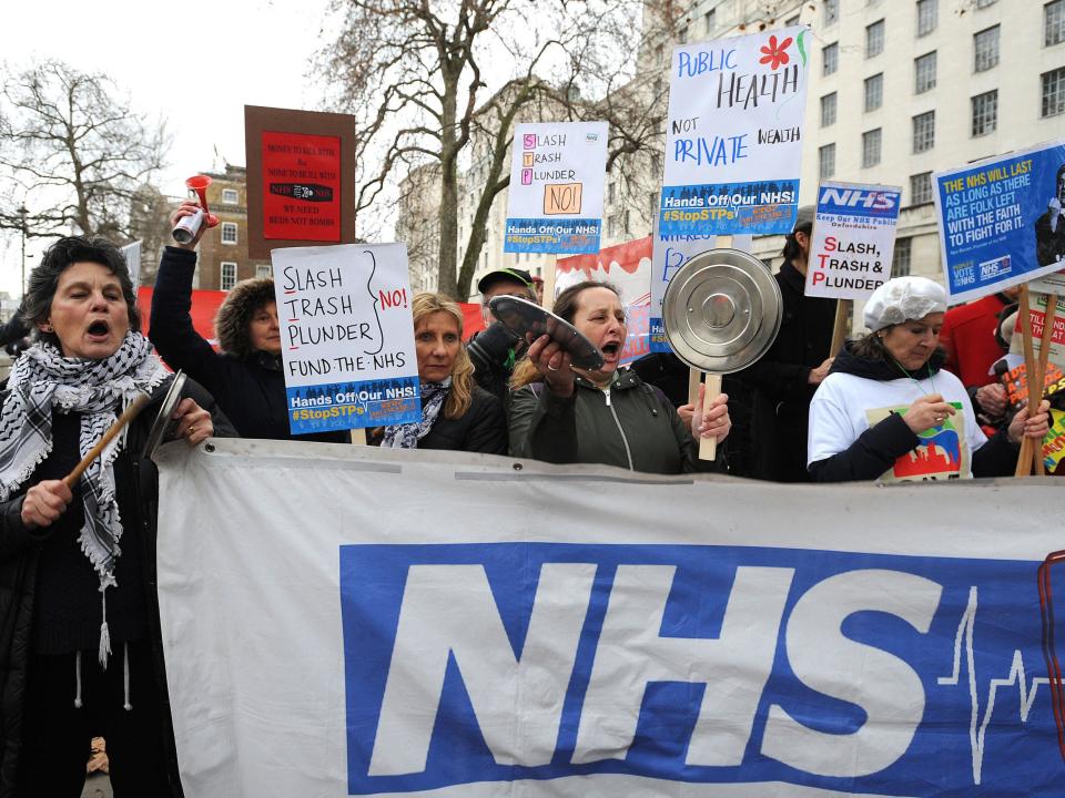 Campaigners at a Hands Off Our NHS demonstration in December: Press Association