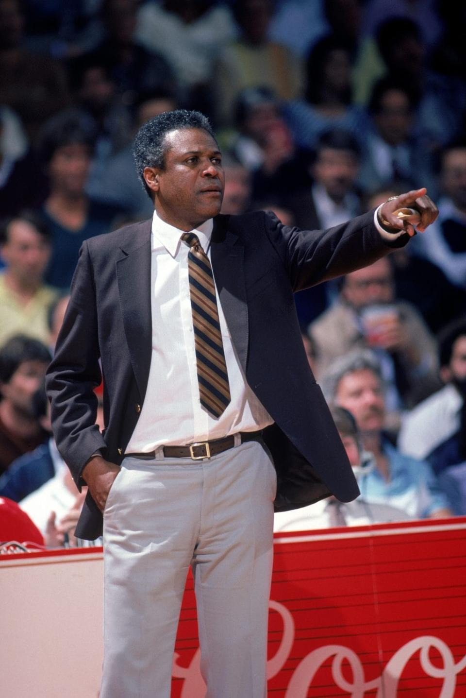 Head coach K.C. Jones of the Boston Celtics points during a NBA season game. K.C. Jones was the head coach of the Boston Celtics from 1983-1988. (Photo by Rick Stewart/Getty Images)