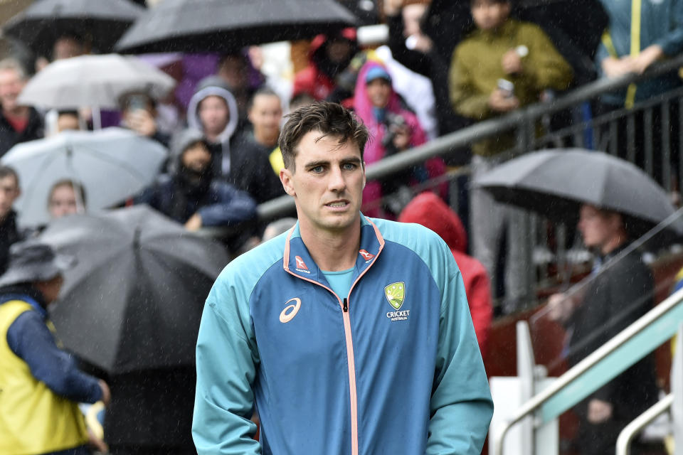 Australia's Pat Cummins leaves after the fifth day of the fourth Ashes Test match between England and Australia was abandoned due to rain at Old Trafford, Manchester, England, Sunday, July 23, 2023. (AP Photo/Rui Vieira)