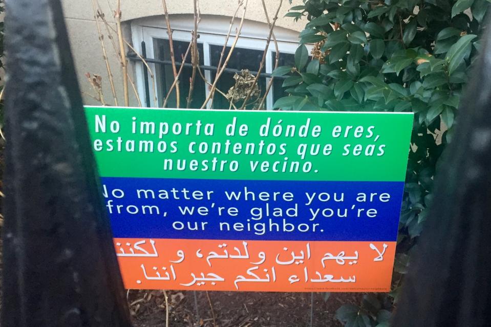 A sign in front of the Holy Trinity Catholic Church