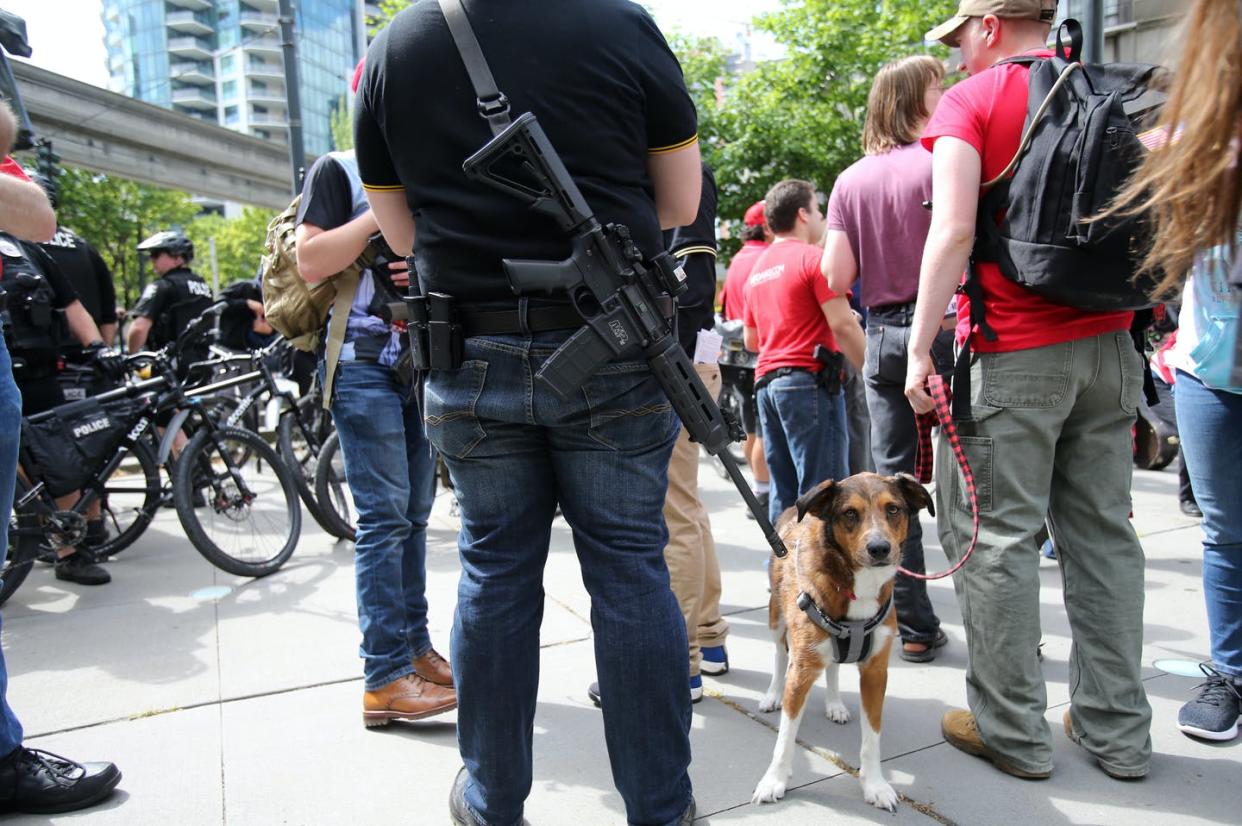 <span class="caption">Dozens of people attended an open carry rally led by Joey Gibson, leader of the Patriot Prayer group, on May 20, 2018, in Seattle. </span> <span class="attribution"><a class="link " href="https://www.gettyimages.com/detail/news-photo/dozens-attend-an-open-carry-rally-led-by-joey-gibson-leader-news-photo/960672862?adppopup=true" rel="nofollow noopener" target="_blank" data-ylk="slk:Karen Ducey/Getty Images;elm:context_link;itc:0;sec:content-canvas">Karen Ducey/Getty Images</a></span>