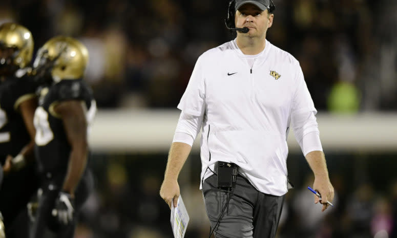 UCF coach Josh Heupel looks on during game.