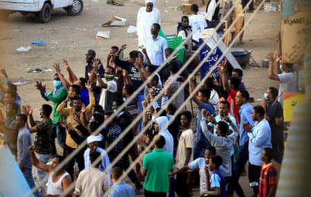 Sudanese demonstrators chant slogans as they participate in anti-government protests in the outskirts of Khartoum, Sudan January 15, 2019. REUTERS/Mohamed Nureldin Abdallah