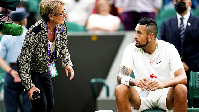 A tournament official, pictured here speaking to Nick Kyrgios at Wimbledon.