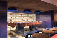 <p>Pink Agave has group seating, metallic blue lamps, and plenty of booze.</p>