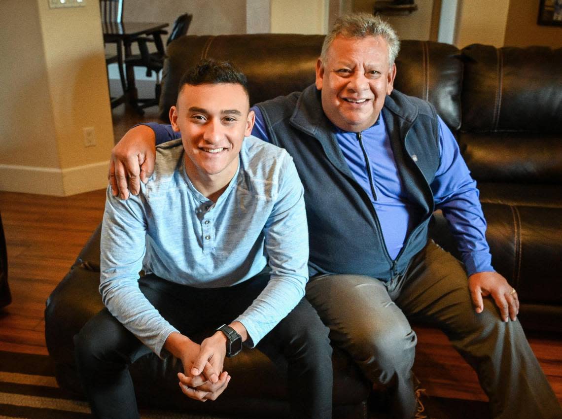 Longtime Fresno television newscaster Rich Rodriguez, right, sits with his son Rhett, who is now following in his father’s TV news footsteps by landing a job as a reporter at KSEE 24 and CBS 47.