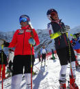 FILE - Lindsey Vonn, of the United States, left, and teammate Mikaela Shiffrin stand at the finish area at the Rettenbach glacier, ahead of Saturday's women's giant slalom Ski World Cup race in Soelden, Austria, Friday, Oct. 23, 2015. Mikaela Shiffrin has matched Lindsey Vonn’s women’s World Cup skiing record with her 82nd win at the women's World Cup giant slalom race, in Kranjska Gora, Slovenia, on Sunday, Jan. 8, 2023. (AP Photo/Giovanni Auletta, File)