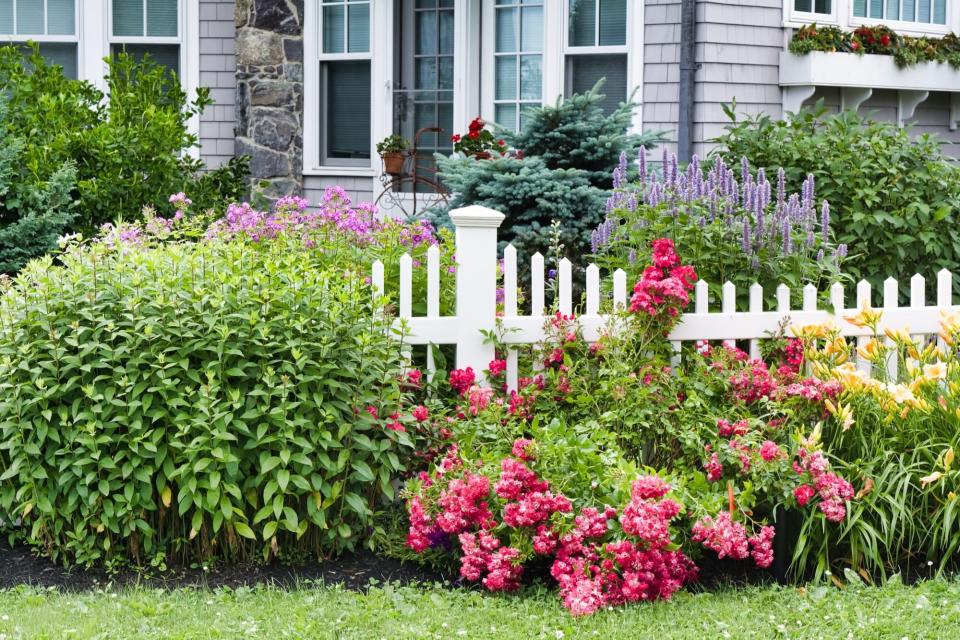 home with white picket fence