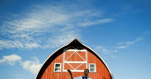 US President Barack Obama speaks during a town hall style meeting in Decorah, Iowa during his three-day bus tour in the Midwest centering on ways to grow the economy