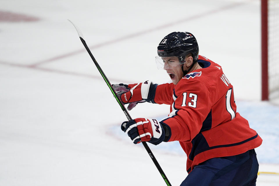 Washington Capitals left wing Jakub Vrana (13) celebrates his goal during the second period of an NHL hockey game against the Buffalo Sabres, Friday, Jan. 22, 2021, in Washington. (AP Photo/Nick Wass)