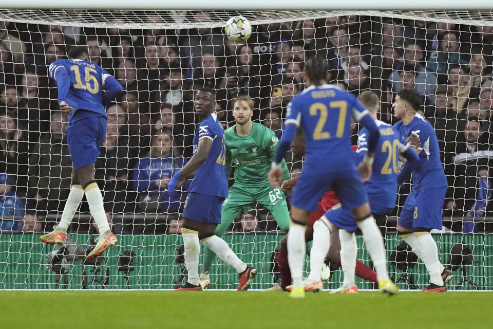 Chelsea's Nicolas Jackson, left, hits a header during the English League Cup final soccer match between Chelsea and Liverpool at Wembley Stadium in London, Sunday, Feb. 25, 2024. (AP Photo/Alastair Grant)