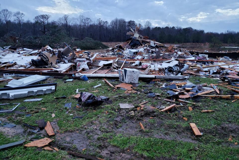 This photo provided by Bossier Parish Sheriff's Office shows damage from Friday nights severe weather, including the home of an elderly in Bossier Parish, La., on Saturday, Jan. 11, 2020. The Bossier Parish Sheriff's Office said that the bodies of an elderly couple were found Saturday near their demolished trailer by firefighters. A search for more possible victims was underway. (Lt. Bill Davis/Bossier Parish Sheriff's Office via AP)