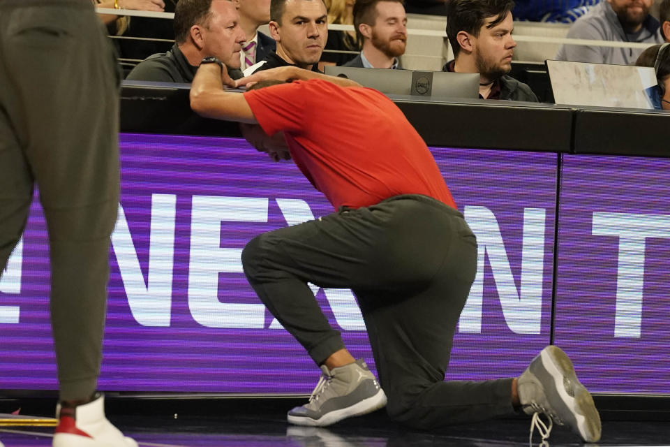 Houston head coach Kelvin Sampson reacts after a call during the second half against Memphis in the finals of the American Athletic Conference Tournament, Sunday, March 12, 2023, in Fort Worth, Texas. (AP Photo/LM Otero)