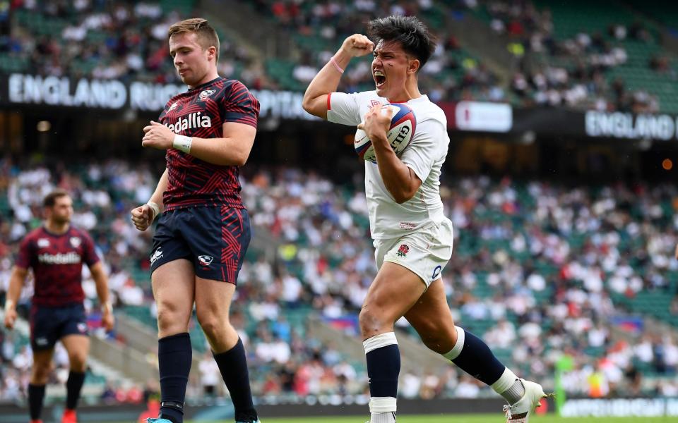  Marcus Smith of England celebrates scoring his sides 6th try during the Summer International between England and USA at Twickenham Stadium on July 04, 2021 in London, England. - GETTY IMAGES