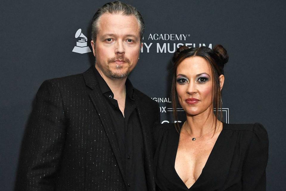 <p>VALERIE MACON/AFP via Getty</p> Jason Isbell and Amanda Shires in March 2023