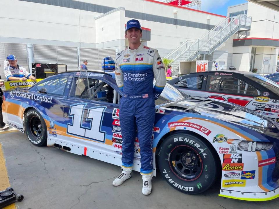 Jayson Alexander poses in front of his No. 11 Constant Contact Ford at Charlotte Motor Speedway on Friday ahead of his NASCAR ARCA race.